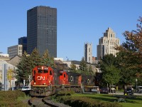 Standard cabs SD60 CN 5484 and Dash8-40C CN 2003 (along with wide cab SD75I CN 5778) are the power on CN 149 as it leaves the Port of Montreal with intermodal tonnage for Toronto and Chicago.
