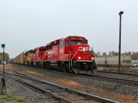  CP 2292 with CP 2261 and UP 8594 roll through Guelph Junction eastward towards Toronto. A very interesting choice of power on todays CP 240 as the lead two GP20C-ECO's have been the power for T69 for a few weeks. The manual switch stand at the left will soon be a thing of the past as well as the "Ham 1" track connection as they are not included in the Guelph Junction upgrade to the Hamilton Sub. The "Ham 2" has already been bypassed.

