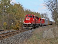 For a change we have a nice clean pair of locomotives for power in CP 5024 and CP 9817 heading todays CP 147 towards Victoria Rd on its way to Orr's Lake. Many a rail fan has spent time sitting on the bench or on the chair hidden behind the concrete block.