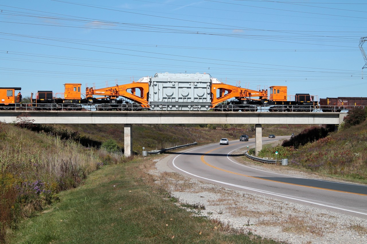 HEPX 200 makes cars on the road look small as it crosses over the Highway 6 Bypass on its way to Nanticoke Ontario for offloading.