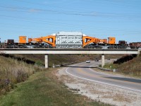 HEPX 200 makes cars on the road look small as it crosses over the Highway 6 Bypass on its way to Nanticoke Ontario for offloading.