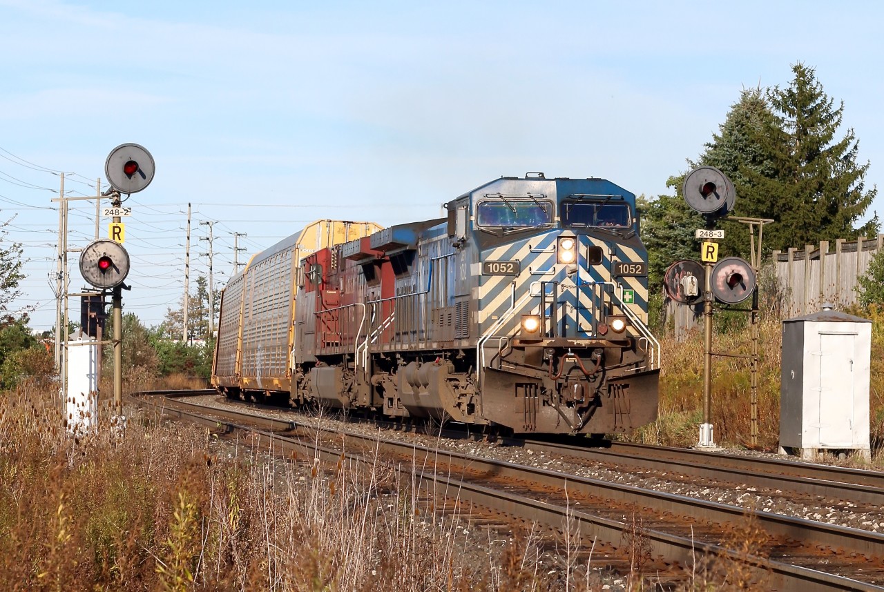 The days of search light signals protecting CP's Galt subdivision may be numbered, but for now the set at mile 24.8 still shine on unaltered. Recently the signals at Streetsville Junction had new LED heads installed, (but not yet activated), so it appears it is only a matter of time before this set is removed for good. With CP's newer GEVO's dominating most trains it is also nice catching a set of older AC4400s, not to mention one of the fading number of CEFX "bluebirds" still active on CP's roster leading. I'm certainly missing the old standard cab EMD's these days.