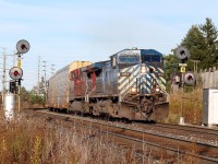 The days of search light signals protecting CP's Galt subdivision may be numbered, but for now the set at mile 24.8 still shine on unaltered. Recently the signals at Streetsville Junction had new LED heads installed, (but not yet activated), so it appears it is only a matter of time before this set is removed for good. With CP's newer GEVO's dominating most trains it is also nice catching a set of older AC4400s, not to mention one of the fading number of CEFX "bluebirds" still active on CP's roster leading. I'm certainly missing the old standard cab EMD's these days. 