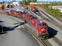 CP 8769, CP 8553 and SD9043MAC CP 9113 lead an eastbound through Lachine IMS yard, as a pair of GP9's (CP 1690 & an unknown mate) look on. Since then the GP9's have all been retired and the SD9043MAC's stored, unlikely to ever see service on CP again.