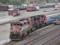 Cn 509  has just finished making its double into track two at the east end of London yard. In the back ground Cn 4761 and 7071 continue there morning assignment switching. Hiding behind the box car is cn 4717 which momentarily will begin switching as well. An unfortunate thing to see for BCR fans, the 4607 some how has lost its lower ditch lights.