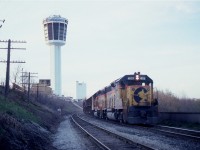 Late day, low light, but still not a bad image........CSX #321 with 4109 and 4396 makes its way west thru Niagara Falls by Portage Av, coming up to the Siding Switch Chippawa. I thought that was the Minolta Tower, but it reads Panasonic, and who knows what they call it now. If the clock is right, it is 5:29 PM when I shot this. The area is unrecognizable these days; tracks are long gone and tourist towers (hotels) have sprung up all over the place.