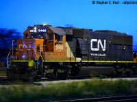 <b>The in laws:</b> After stuffing my face with my Mother in Law's wonderful food, I retired to watch a few trains with the usual evening Sarnia station gang. I hadn't spent time trackside all week and having arrived earlier in the afternoon I was itchy to smell the creosote. We had a pair of 271's and 323 (east) coming so a good solid hour of trains was before us. Anticipating 271, and out of nowhere,this SD60 comes rolling by on yard track westward as 271 (5611 west) was going through the scanner for the tunnel. Turns out this was Train 501 wyeing their power prior to a run to Port Huron. With a little bit of light left (and some yard lights to lighten the foreground) I decided to give it a shot, and in aperture priority mode, dialed down to f/4 and just snapped a few hoping one would turn out - this one was sharp at 1/15th a second. I didn't plan to take any photos, but with the camera in hand I tried the same on 271, but the north track doesn't have very good lighting, and nothing turned out. As soon as 271's tail end cleared, 5448 rolled by again and my attempts all failed, the light was failing fast! Lastly, following on 501's heels was a yard job with 7230 and three cars - again my attempts to capture anything failed, so I put the camera away. I watched 323 and the final 271, and after getting my fill went home to relax and hit the sack. You just don't know what will roll by when you visit Sarnia Station, and six movements in about an hour is darn good. Many people seem to loathe visiting their in-laws but I've always enjoyed the visits, 18 years and counting.