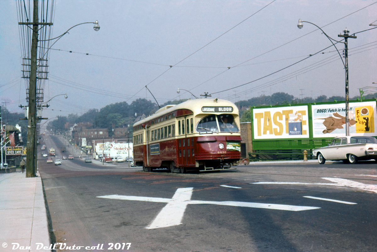 The crosstown Bloor-Danforth streetcar line was the second-busiest route on the system, hopping with streetcars both operating in multiples and singles, which put it next by ever-growning Toronto for replacement by a subway line. Almost six years before the Bloor-Danforth subway would open to replace it, TTC PCC 4432 is seen heading eastbound on Bloor Street West at Indian Road (operating on a short turn run to Lansdowne Loop), climbing the hill from the Keele St. / Parkside Drive intersection below. The gleaming glossy paint suggests 4432 had recently been either repainted, or given a good spit 'n polish job by carhouse forces. Judging by the shadows this would have been a late morning/early afternoon photo, and going by the mount process date (July 1960, but USA-developed) it would have likely been taken sometime in June or July of 1960. Bloor Street still bears sections of road done with red interlocking pavers, although they're looking rather spotty in some places.

It's also interesting to note some of the old 1960-era advertisements visible: a BA Oil (British American) gas station, ads for Stokely's Honey Pod Sugar Peas, Puddicombe Used Cars (a local car dealership in the area), Belvedere cigarettes ("TASTE"), Fetch dog food, and the Royal Bank of Canada (blue side ad on streetcar). 

This Ektachrome slide acquisition taken by an unknown photographer had badly cyan colour shifted and was showing signs of surface deterioration (etching or fungus growth on the surface), likely from years of poor storage. I gave it a bit of TLC in Photoshop, correcting the colour as best as I could and digitally cleaning all the surface spots that had developed by hand. Some careful cleanup is a small price to pay for an otherwise nice photo.

Photographer unknown, Ektachrome from the Dan Dell'Unto collection.