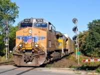 CN E27691 29, with UP 5876, and UP 8948, splitting the signals at Hardy with 80 Autoracks destined for Oshawa, ON 