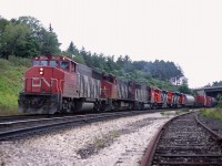 According to my notes, this was the last train I saw on a rather productive Wednesday away from work. It is late day and the sun fortunately is behind cloud, otherwise this shot would be toast. Because the last two units, SD40-2 (wide) are brand-new and on their very first run, I went to Aldershot to get more photos of them as this eastbound worked the yard until sunset. Power is CN 9659, 2541, 9452, 5299 and 5298. I did not record car count but two cabeese brought up the rear, #79523 and 79558. I miss the Zebra Stripes.........
