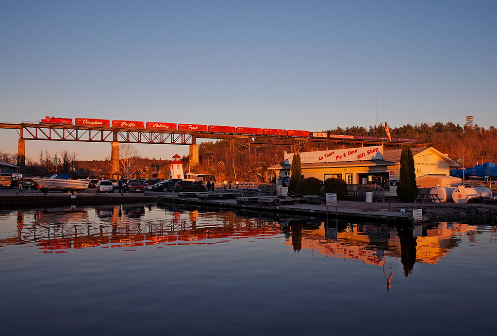 Rolling in for it's last daylight stop, the Canadian Holiday Train crawls over the bridge in fading light.