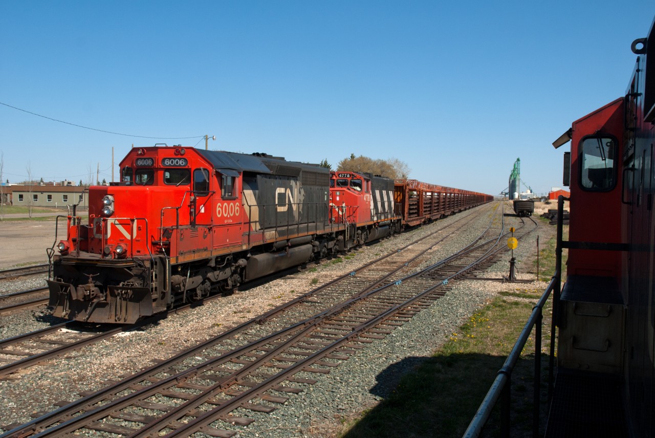 A CN CWR train is seen idling the weekend away in Vermilion Alberta. I sure would like to see a 6000 on the main again.