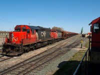 A CN CWR train is seen idling the weekend away in Vermilion Alberta. I sure would like to see a 6000 on the main again. 