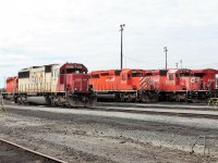 The last SOO SD60 #6027 poses at the shop's west end tracks with a few of the remaining SD40-2's at the yard. Does anyone know it's current whereabouts as it was shipped out this summer with engine damage to possibly be rebuilt into a 6300 series loco.
