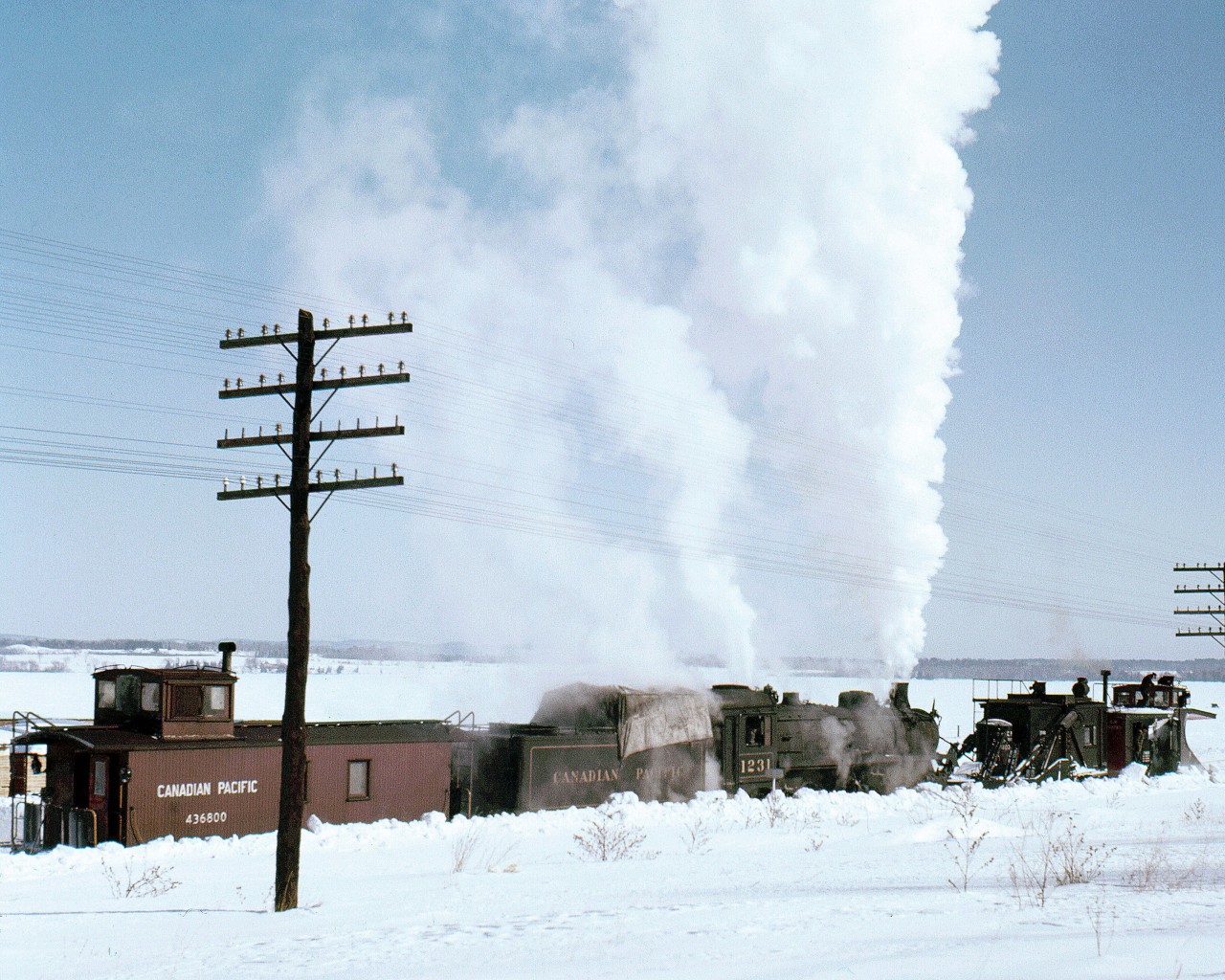 Pembroke native, the late Mr. Del Rosamond, captured CPR Pacific-type #1231 with a plow and spreader – circa 1959. 

 
Those familiar with RPca may recall that two years ago I had a number of Mr. Rosamond’s slides professionally scanned.  The process was not in-expensive and not all of my slides were processed.  I’m extremely grateful to Mr.  Raymond Farand for volunteering to assist.   He has carefully scanned the remainder of my collection and spent countless hours making colour corrections and repairing age -related slide damage.


Raymond and the Rosamond family have graciously approved  the sharing of my portion of the Rosamond collection here on RPca.  


Peter Newman