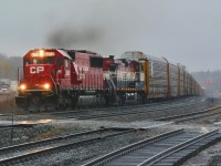 In extremely less than ideal conditions, CP 147 charges up through Guelph Jct. with an usual power set. It was great to see so many out in the downpour!