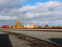 A yard work train heads east powered by a lone GP20eco #2269.