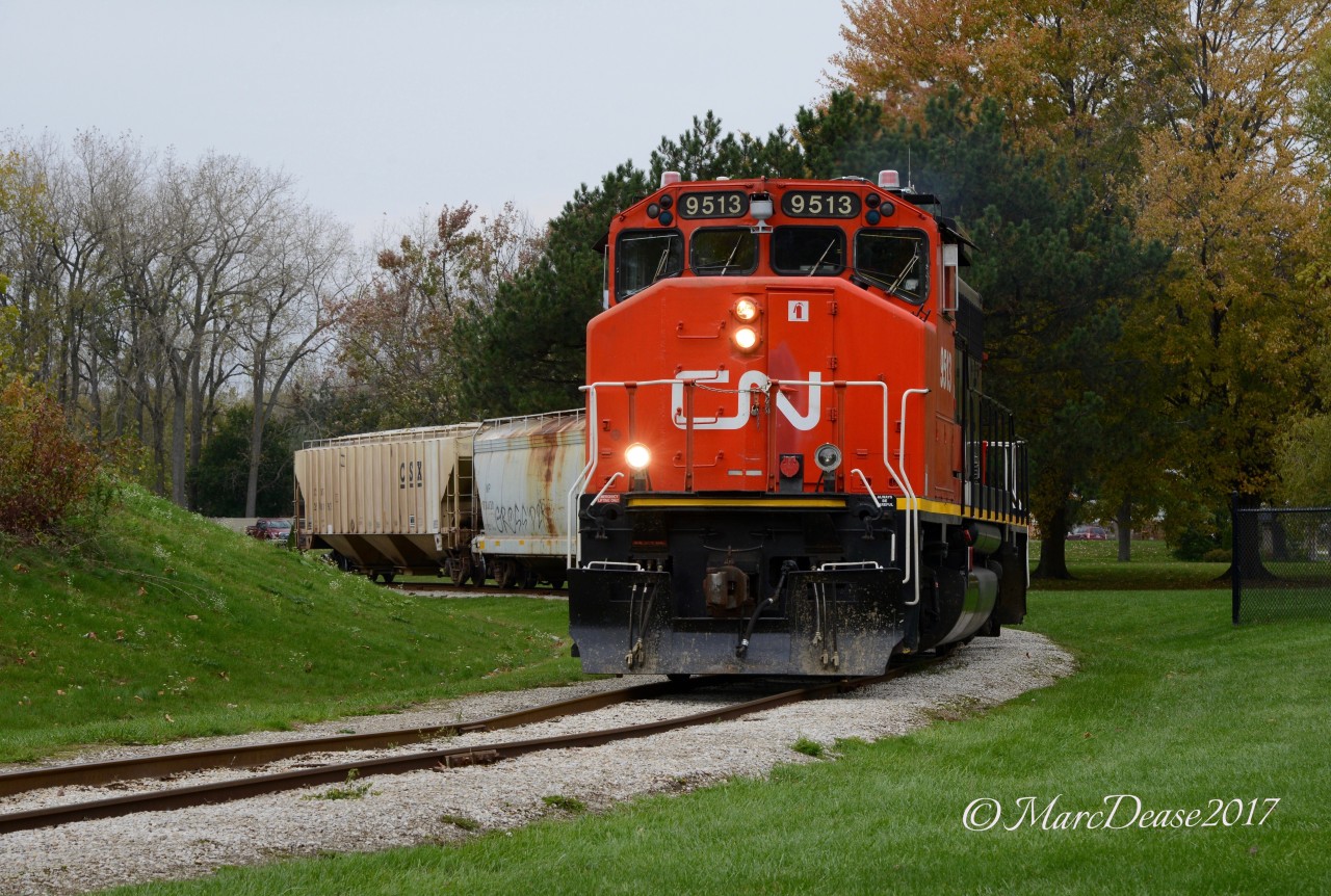 CN 9513 along with CN 4785 working the IOX job, return from the elevator in Sarnia with a very short cut of cars.