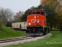 CN 9513 along with CN 4785 working the IOX job, return from the elevator in Sarnia with a very short cut of cars.