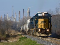 In the shadow of the Suncor Refinery, CSX 2799 with CSX 2570 head for the CN Yard with a cut of 31 cars.
