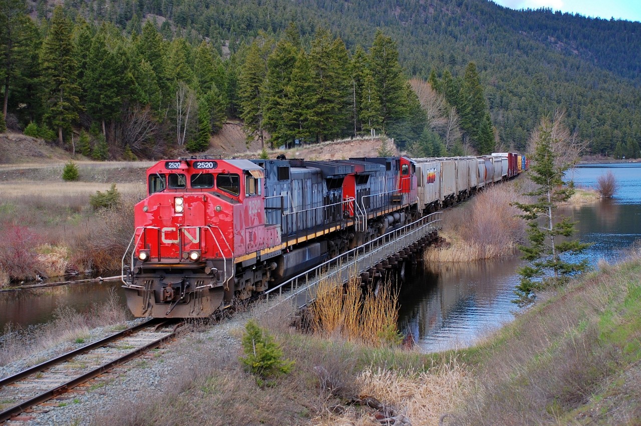 Got lucky in catching CN nos.2520 & 2632 rolling across the Monte Lake trestle with a southbound load of empties.