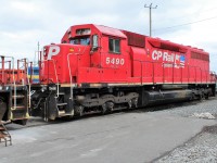 SD40M-2 5490 on it's way out after being retired. It was originally a Southern Pacific SD45 that was rebuilt for CP by Morrison Knudsen.