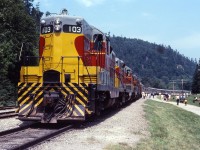 Once a common theme for daytripping railroad customers in the 19th century, railroad built parks are largely a thing of the past. Agawa Canyon tour train at the Agawa Canyon park, one of the few railroad built and operated parks still used to generate business for a railroad in North America, and Doug Page was on hand to capture this beautiful train in July 1979. The park and train still run in 2017 under CN.