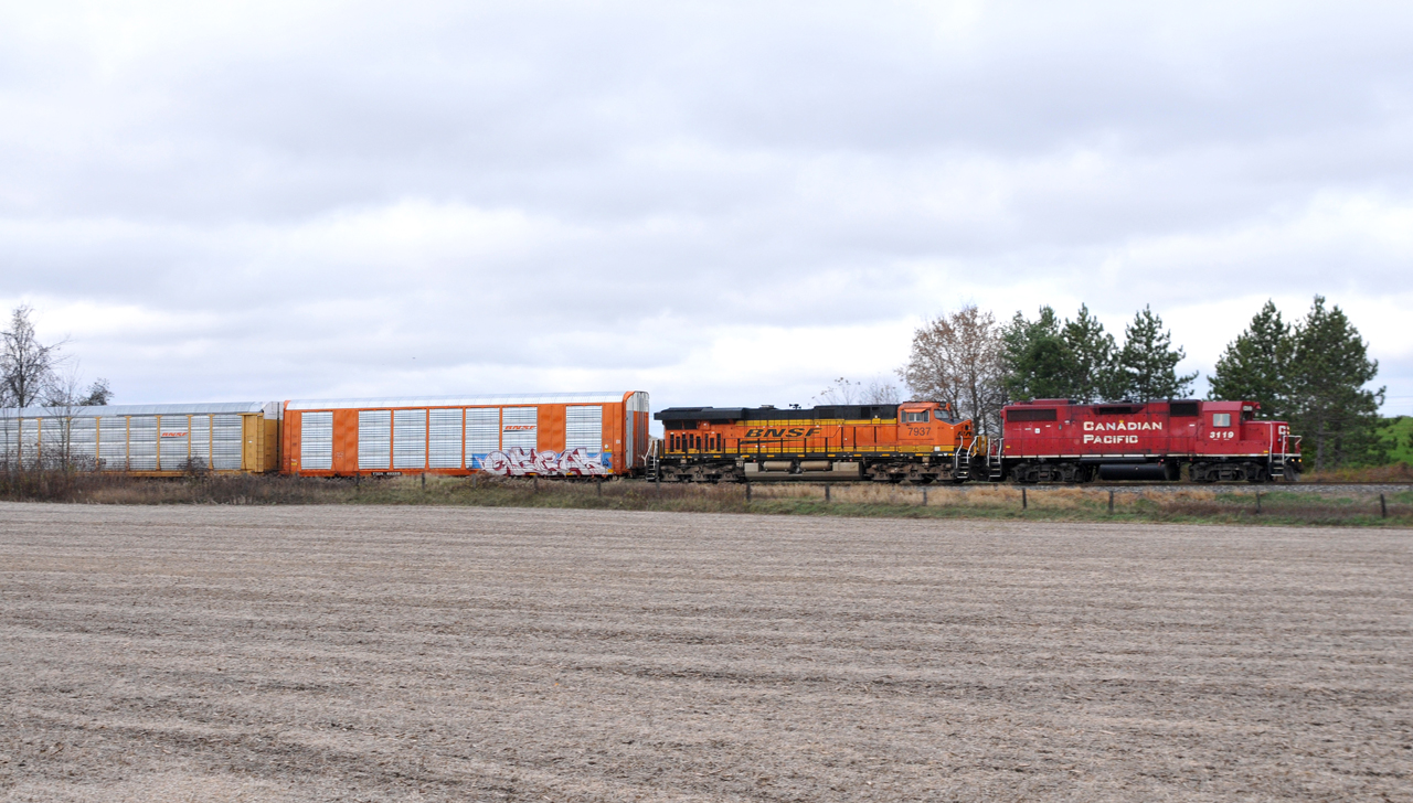 Back on the move after setting off at Pender, 244 is headed for Wolverton with CP 3119, and BNSF 7937. They'll drop their remain 44 autoracks there, and run light power to Toronto