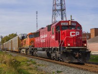 It's always a great day for railfanning when you just go out to see what action there might be. Lucky for me, here is this day's version of 244 coming out of Ringold siding and now gathering speed as it travels through downtown Chatham. It's always a great catch when you have ex-SOO 6042 leading with a trailing BNSF unit. If I had planned this better, I would have tried to Time Machine <a href="http://www.railpictures.ca/?attachment_id=28972"> Bruce Mercer's photo from 1987. </a>