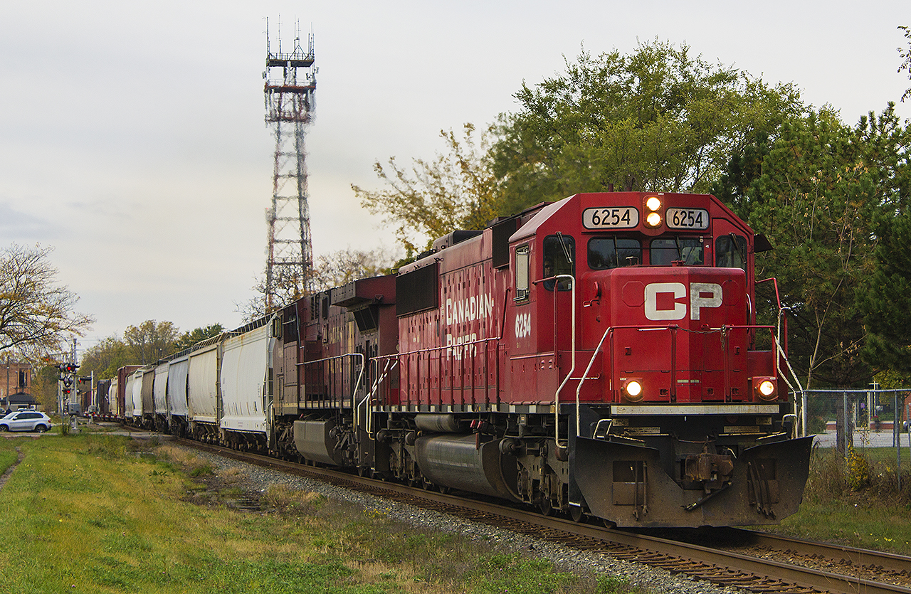 In recent weeks there has been a lot of former SOO engines on the point for the CP. Here, rebuilt SOO now CP 6254 leads their eastbound train though downtown Chatham. It's too bad that they had to move the former CP station. It would have made for a better backdrop against the train than the Municipal parking lot with the row of trees.