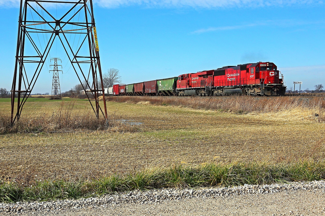 CP 6257, with helper CP 8849, is in charge of train 140 at mile 91.8 on the CP's Windsor Sub.