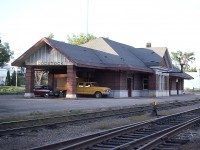 Beautiful old solid looking structure, this CPR station in downtown Woodstock. It was constructed in 1911, but unfortunately was destroyed by fire in 1998. Remarkably enough, the station it was built to replace still survives. The CP line thru here no longer exists either, having being pulled up a number of years ago, around 1992. The old line is...what else?....a walking trail.