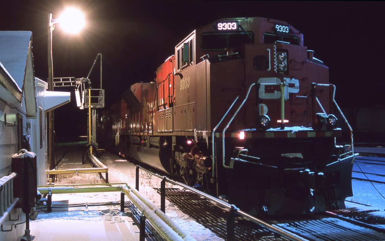 One of CP's four Brutish SD90MAC-H units sits tied down and revved up on a bone chilling -36C night in Bredenbury yard.