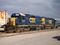 CSX power basks in the sun as the crew gathers inside the station, returning with a bag of gloves, before departing to switch Praxair and interchange with CN. The sun wouldn't last long however as a lake effect snow squall would soon blanket the area. 