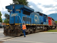 IC 2460 & CN 5351 have just finished switching the pellet plant in downtown Armstrong and after putting their train back together will proceed to Kamloops with the SD40-2W running long hood forward.