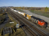 CN 522 with clean zebra-striped CN 9576 puts its train together at Southwark Yard before heading south on the Rouses Point Sub with cars for St-Jean-sur-Richelieu.