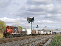 For the second time in about an hour, CN 596 is leaving Southwark Yard for nearby Pointe St-Charles Yard on the other side of the Victoria Bridge as GP9 CN 7228 and slug CN 218 lead about twenty cars westwards.