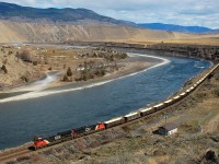 A pair of Tier4's are rolling through Walhachin in charge of a mixed freight that includes a string of sulphur cars.