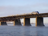 It was well below freezing in Montreal today and a bit of snow fell, so I figured I'd post a shot from a very cold morning last winter.... Here F59PHI AMT 1325 pushes a deadhead move towards the South Shore of the St. Lawrence River, to get more commuters for Montreal.