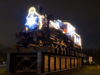 After shooting CP's Holiday Train in nearby Delson, I stopped by the Exporail parking lot in St-Constant to shoot OSC 25, which is decorated with Christmas lights. This engine was built by Baldwin in 1900 and not retired until 1962.