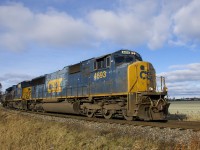 CN 327 is leaving the Kingston Sub as CSXT 4693 & CSXT 3255 lead 103 cars onto the Valleyfield Sub at Coteau.