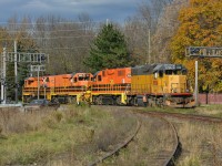 The locals of Guelph go about typical daily operations where 582 from Cambridge will interchange with 580 from Kitchener. Pictured, 580 reversed over the crossing to allow 580 to drop their train in XV yard. Operations went as followed... 580 pulled forward after cutting their train and needed more room to clear the switch causing 582 to reverse further, 580 then reversed further, 580 pulled forward in to the wye, 582 pulled forward to pick up 580's train to take to North Guelph, 580 came out of the wye, switched the yard, and then reversed 15 or so cars back around the wye to the main. 