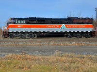 A year ago I shot the Bangor & Aroostook heritage unit (CMQ 9017, an ex-CP SD40-2F) in Quebec for the first time as it layed over in Farnham. Here is a broadside shot of the shiny at the time unit.