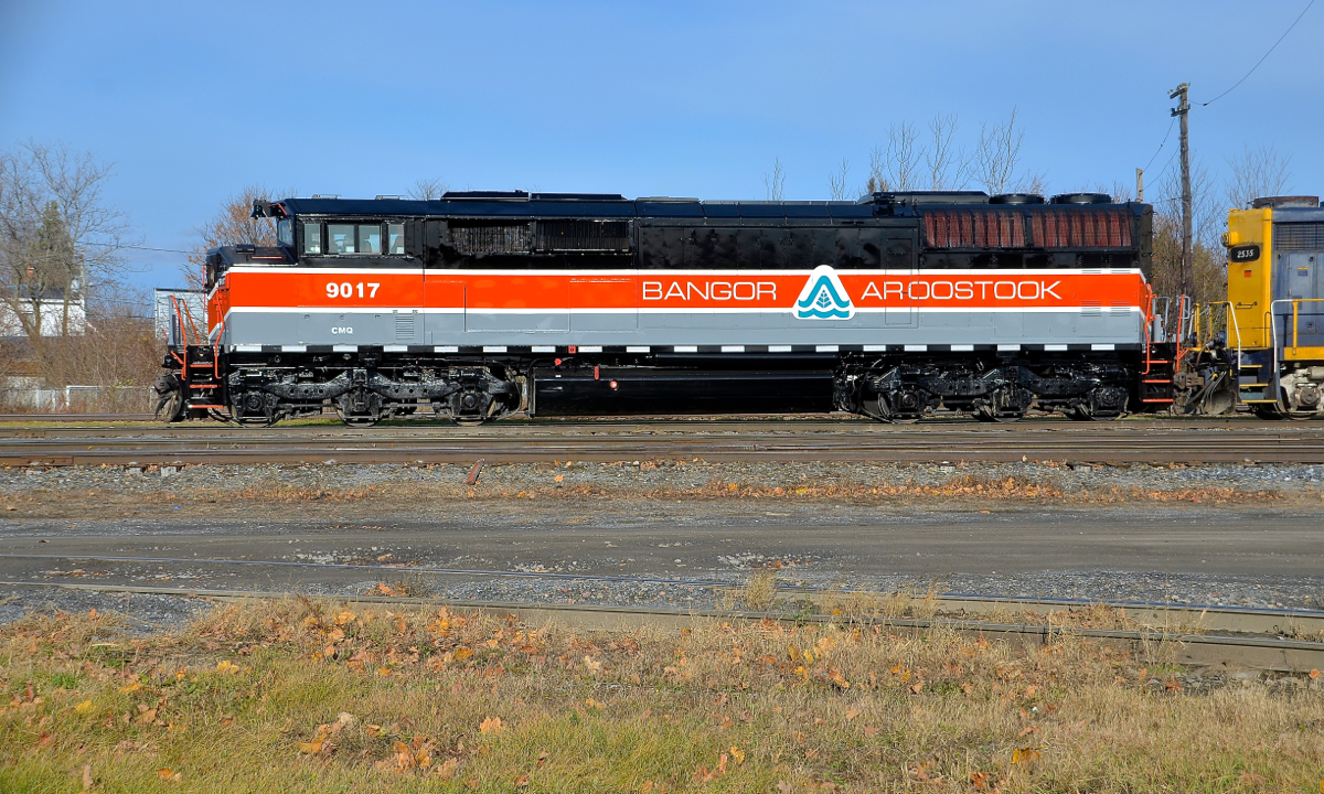 A year ago I shot the Bangor & Aroostook heritage unit (CMQ 9017, an ex-CP SD40-2F) in Quebec for the first time as it layed over in Farnham. Here is a broadside shot of the shiny at the time unit.