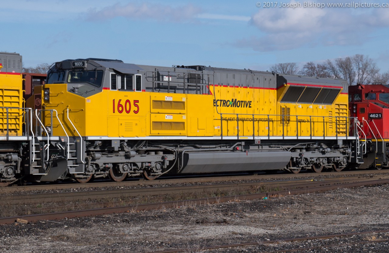 EMD Tier 4 Demonstrators on CN  EMDX 1605 and EMDX 1606 were in transit on CN M323 through Brantford this afternoon on their way to Winnipeg.  In October of 2015, Progress Rail unveiled their Tier 4 version of the popular SD70Ace model.  Demonstrator units began to arrive on Class 1 properties throughout 2016.  Thus far only Union Pacific has committed to orders of the new model, but with the news of GE looking to sell their locomotive division in the news recently, one has to wonder whether we will be seeing more new EMD units appearing on CN as well.