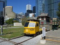 A signal head, a CP speeder and Cabin D (a wooden interlocking tower built by the Grand Trunk Railway in 1896) are seen at the Roundhouse Park near downtown Toronto.
