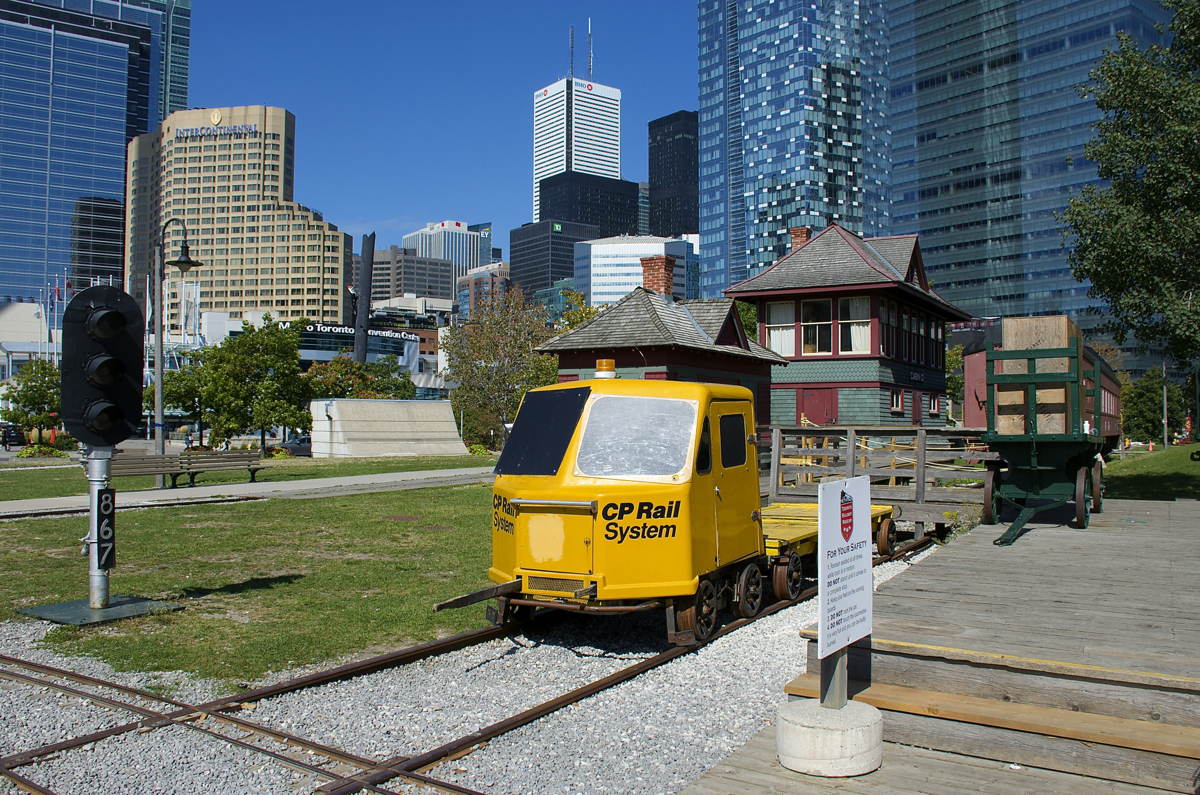 A signal head, a CP speeder and Cabin D (a wooden interlocking tower built by the Grand Trunk Railway in 1896) are seen at the Roundhouse Park near downtown Toronto.