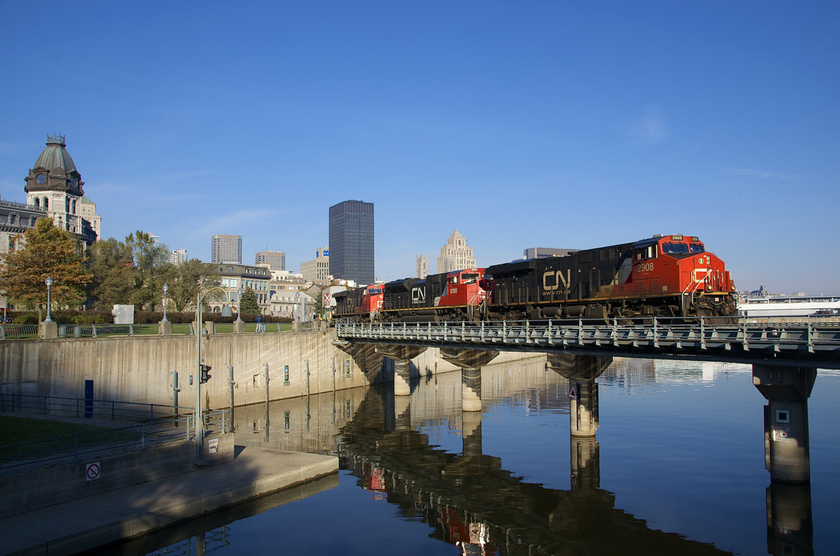On a cloudless morning, CN 149 is leaving the Port of Montreal with three AC units (CN 2908, CN 8100 & CN 2967) arranged elephant style. If CN 149 is on time (which it usually is), this angle is only doable with good lighting during the shorter days of late fall and early winter.