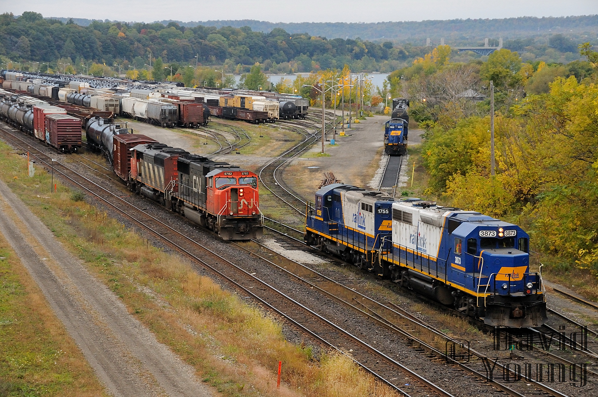 Blue, white and a touch of yellow. And not to forget that elongated hockey stick logo... One of my favourite schemes that I will miss around here. Before the influx of orange here's Stuart Street as I came to know it. RLK 3873 and 1755 are moving forward to clear the switch before backing up to grab another cut of cars to switch out while CN 421 pulls their lift out to the mainline with CN 5782-CN 5516. In the distance RLK 1808 sits idle at the end of the shop track.