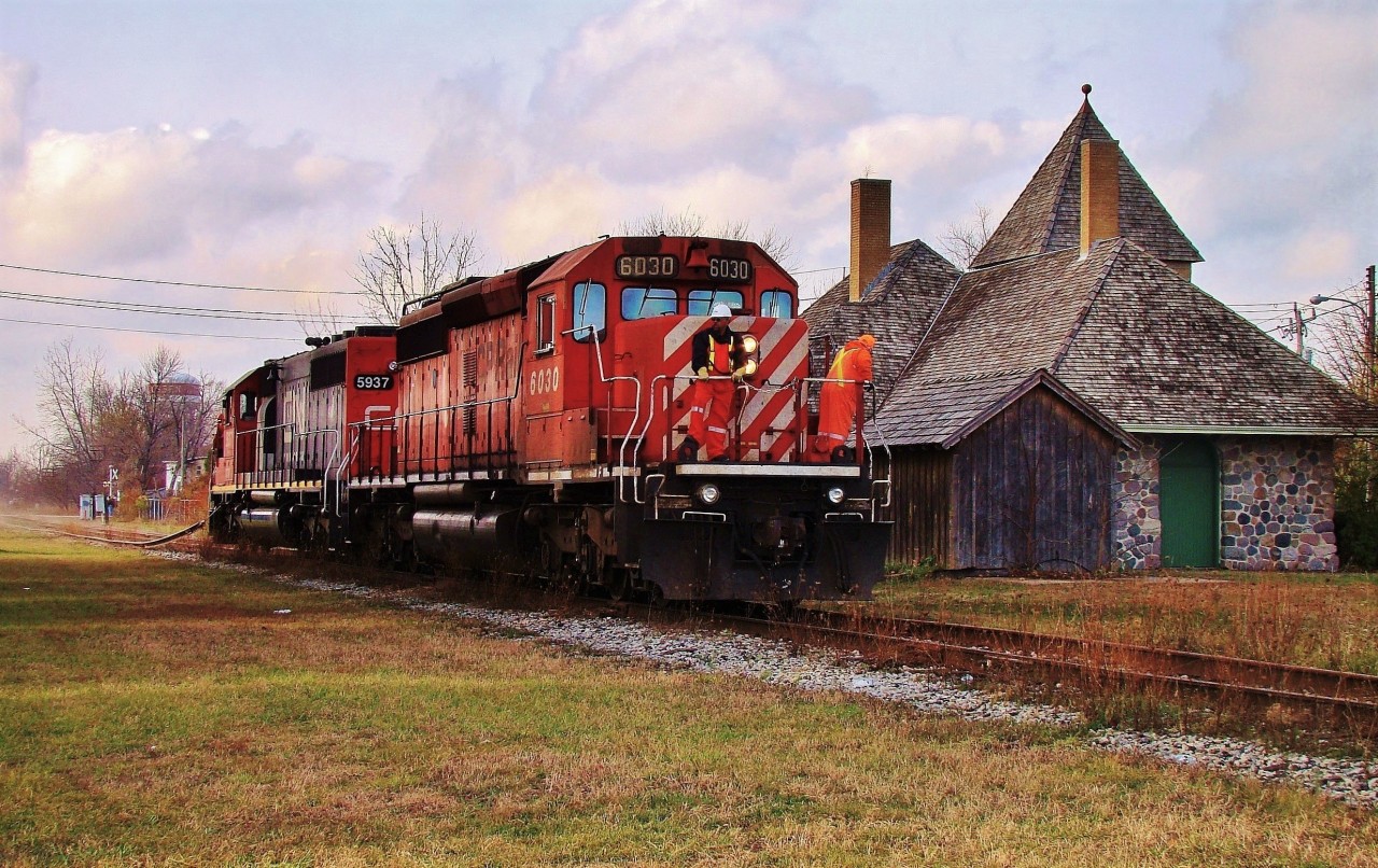 Five years ago the removal of the west end of the CASO had begun. Here CP 6030 and GTW 5937 drag the first cut of rail past the historic Essex Station, power representing both owners of the line (CN&CP). This would be the last 'train' to pass the station as the second cut of rail would be just east of here. They hooked the rails onto each side of the locomotive then dragged them east for loading onto a CWR-train - an interesting way to remove a rail line.